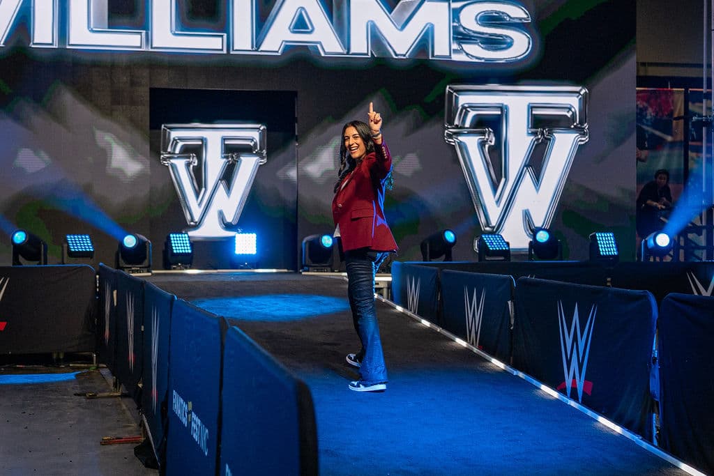 Guest walking the lit entrance ramp at Fanatics Fest NYC during a VIP itinerary