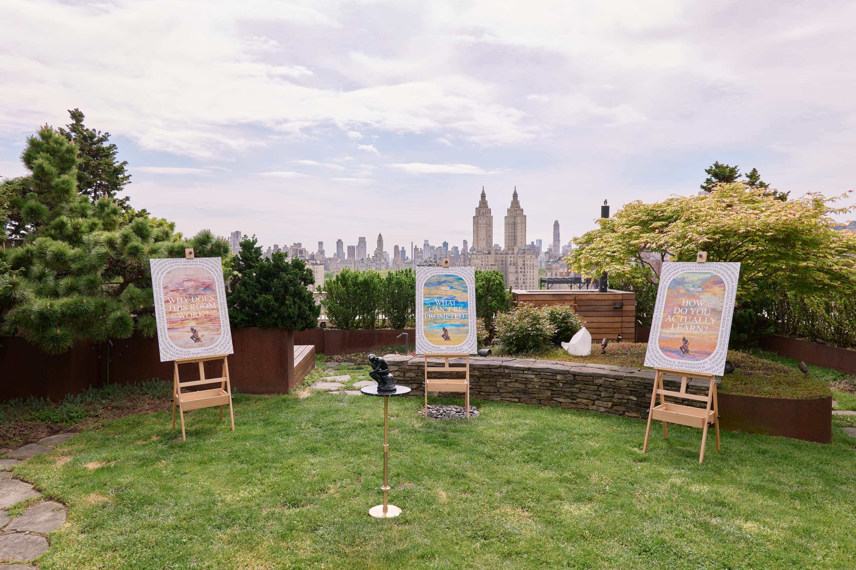 Private rooftop garden set for an event with the Manhattan skyline behind it